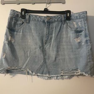 Denim skirt with detailed cut outs